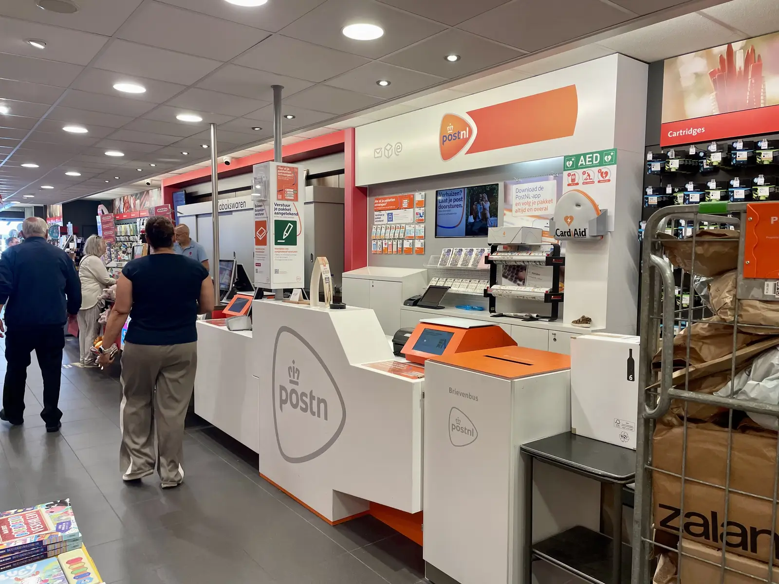 PostNL service point with an indoor letterbox for letter mail